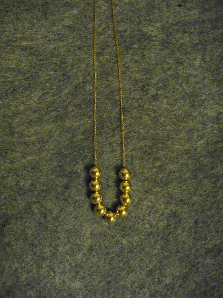 add a bead necklace